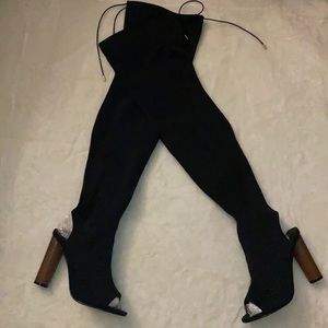 Sexy thigh high boots with adjustable strings.
